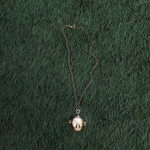 African bronze head pendant chain